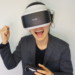 VRのゲームで勝利して喜ぶ男性